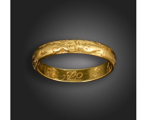 A George I gold memento mori ring, the exterior engraved with a skeleton and cross bones, and a crossed pick and shovel below