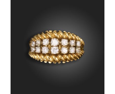 A diamond two row gold ring, the graduated round brilliant-cut diamonds set within twisted gold borders on a plain gold shank