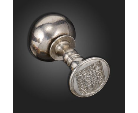 An 18th century silver desk seal, the ball handle over a double spool stem, spreading circular foot carved with the arms of T