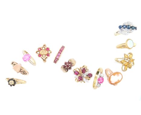 Twelve gem-set rings, including; a ring set with a pink sapphire between circular-cut diamond shoulders, a 9ct gold hallmarke