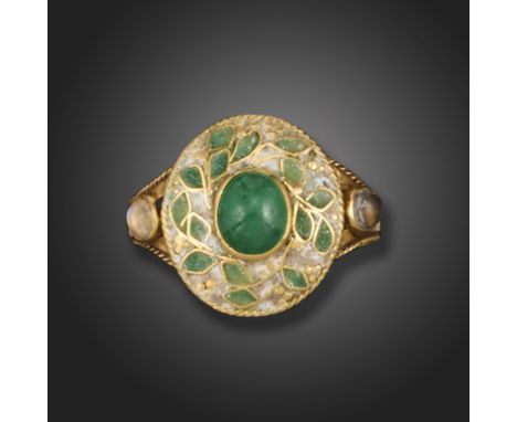 An Arts &amp; Crafts emerald-set gold ring, the oval ring centred with a cabochon emerald, within a surround of foliate polyc