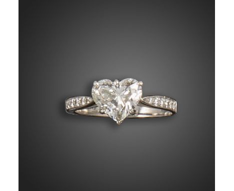 A diamond solitaire ring, the heart-shaped diamond weighing 1.19cts, set with round brilliant-cut diamonds to the shoulders i