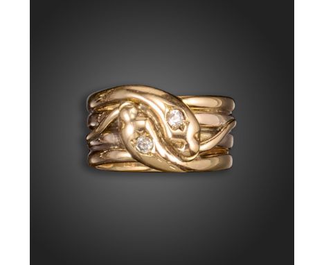 An early 20th century diamond-set snake ring, the two intertwined serpents each with a diamond to their heads, their coiled b