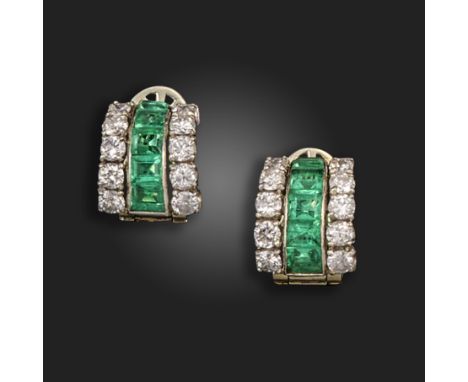 A pair of emerald and diamond hoop earrings, set with graduated calibre-cut rubies within borders of graduated circular cut d