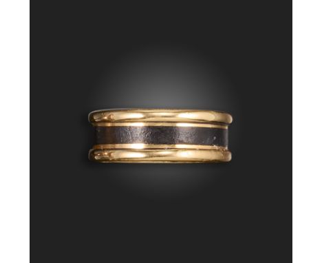 A Victorian gold mourning ring, with a central band of black enamel between gold borders, internal mourning inscription dated