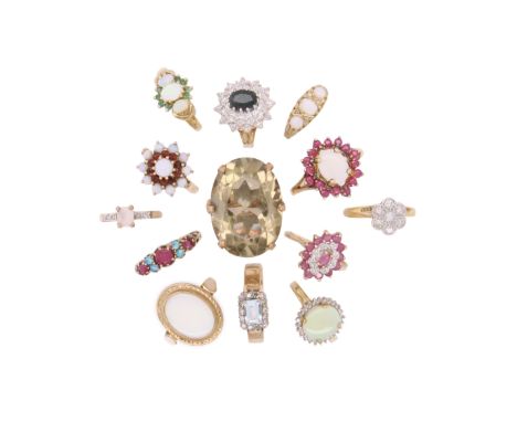 13 gem-set gold rings, including an opal and ruby half hoop ring, a diamond cluster ring, an opal and ruby cluster ring and t