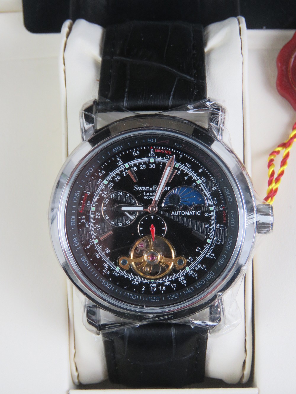 A Swan and Edgar gentlemans automatic wristwatch having leather strap.