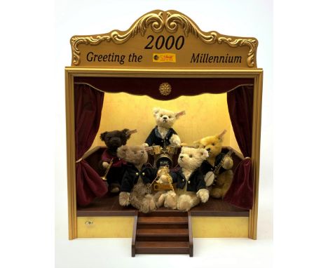 Steiff limited edition 'Millenium Dream Band' of five teddy bears on a stage playing various musical instruments, steps to th