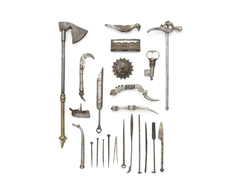 A collection of Qajar steel tools Persia, 18th-19th Centurycomprising a powder measure; a set of ember tongs and pricker in t