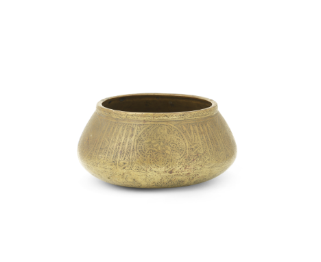 A Fars brass bowl Persia, 14th Centurywith rounded base, inverted sides and flattened rim, engraved with a series of roundels