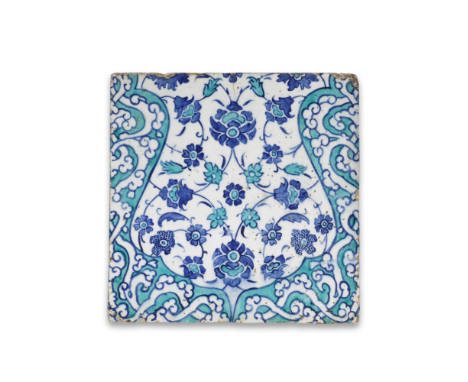 An Iznik pottery tile Turkey, circa 1560of square form, decorated underglaze in turquoise and cobalt blue on a white ground, 