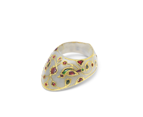 A Fine Mughal gem-set jade archer's ring North India, 17th Centuryof typical form, decorated in ruby, emerald and glass inlay