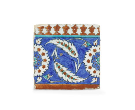 An Iznik pottery tile Turkey, circa 1575-80of square form, decorated in cobalt blue, turquoise and raised-red with black outl