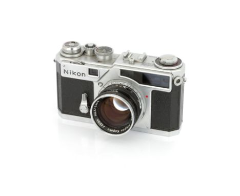 A Nikon SP Rangefinder Camera, 1957-64, chrome, serial no. 6220201, with Nippon Kogaku Nikkor-S f/1.4 50mm lens, black, seria