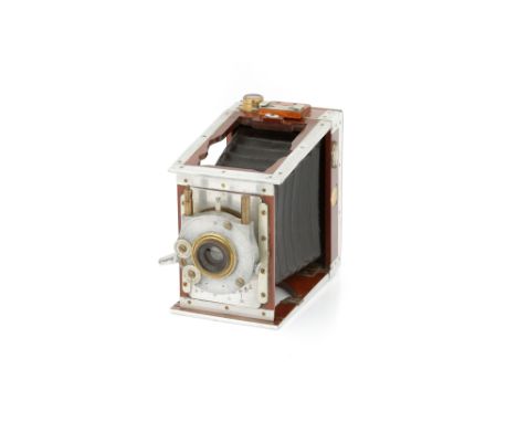 A Shew &amp; Co. Xit Aluminium Mahogany Strut Camera, 1910, 3¼×4¼", with Ross Zeiss Patent f/6.8 7¼" lens, brass, serial no. 