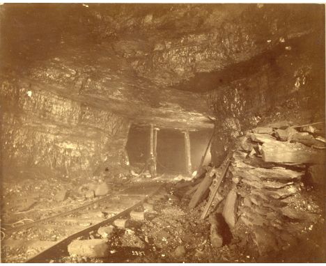 Interior of Coal Mine Photographed by Electic Light, vintage brown toned silver gelatin print, c.1900-1910, label recto 'Unit