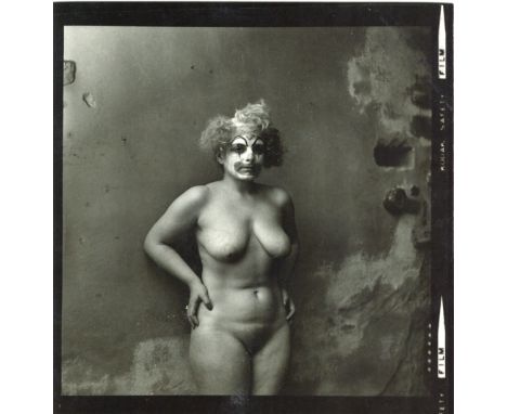 JAN SAUDEK (1935-) Nude with Clown's Face, vintage gelatin silver print of female nude with clown's face, c.1980, numbered 32