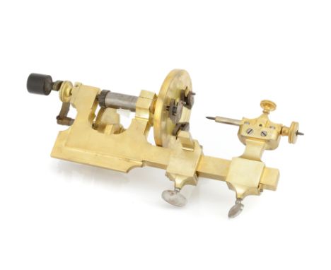  English, Late 19th Century, unsigned, with hand crank driven gear to main steel spindle, 12cm diameter faceplate with 3 fixi