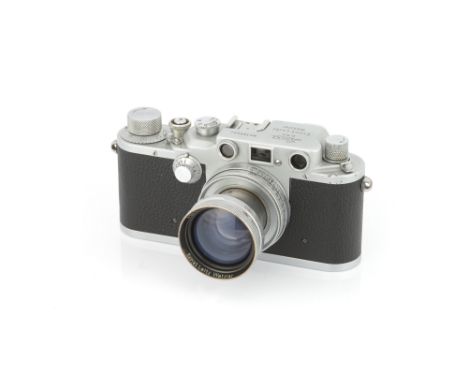 A Leica IIIc K Rangefinder Camera, 1941/42, 'chrome', serial no. 389604, with Leitz Summitar f/2 50mm lens, 1939, chrome, ser