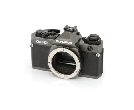 An Olympus OM-3Ti SLR Body, 1995-97, titanium, serial no. 1001352, body, G-VG, shutter working