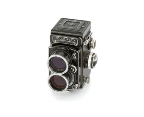 A Rollei Tele-Rolleiflex TLR Camera, 1965, black, serial no. 2302099, with Carl Zeiss Jena Sonnar f/4 135mm lens, serial no. 