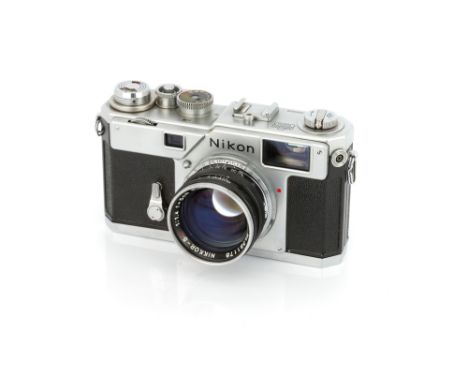 A Nikon S3 Rangefinder Camera, 1958, chrome, serial no. 6306229, with Nippon Kogaku Nikkor-S.C f/1.4 50mm lens, black, serial