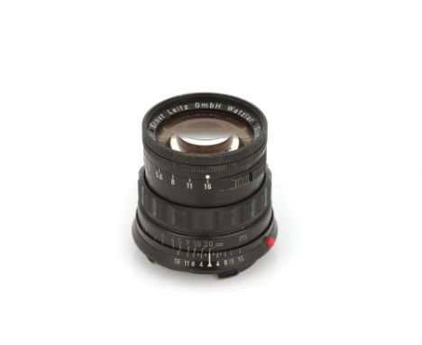 A Leitz Summicron f/2 50mm Lens, 1958, black paint, brass mount, serial no. 1587367, body, G, some brassing and bubbling to p