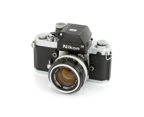 A Nikon F2 Photomic SLR Camera, 1976, chrome, serial no. 7841408, with Nikkor-S f/1.4 50mm lens, black, serial no. 603311, bo