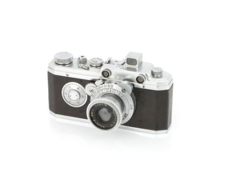 A Canon Hansa Original Rangefinder Camera, 1936-37, chrome, serial no. 625, with Nikkor f/3.5 50mm lens, body, VG, shutter wo