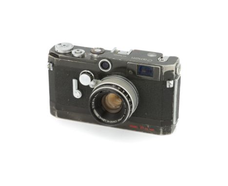 A Canon VT de Luxe Rangefinder Camera, 1957, black repaint, serial no. 542429, with Canon f/1.8 35mm lens, chrome, serial no.