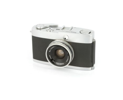 A Kowa SW Compact Camera, 1964, chrome, serial no. 702513, with Kowa f/3.2 28mm lens, serial no. 701084, body, VG, shutter no