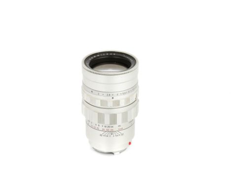 A Leitz Summicron f/2 90mm Lens, 1960, chrome, serial no. 1740915, body, G-VG, elements, VG-E, complete with maker's lens cap