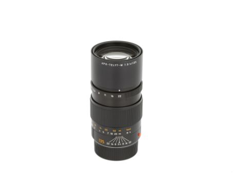 A Leitz APO-Telyt-M f/3.4 135mm Lens, 2004, black, serial no. 3956288, body, E, elements, E, with caps and maker's case