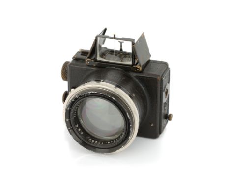 An Ernemann Er-Nox 4.5x6cm Camera 1924, black, serial no. 1185267, with Ernemann Ernostar f/2 100mm lens, serial no. 150689, 