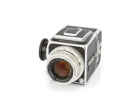 A Hasselblad 500C Type 1 Medium Format Camera, 1957, chrome, serial no. CU30425, with Carl Zeiss Jena Planar f/2.8 80mm lens,