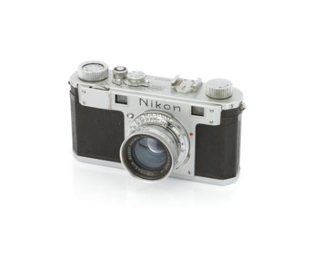 A Nikon M Rangefinder Camera, 1950, 24x34mm, chrome, serial no. M6091401, with Nippon Kogaku Tokyo Nikkor-H.C f/2 50mm lens, 