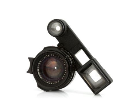 A Leitz Summilux f/1.4 35mm Lens, 1970, with ocular attachment, black, serial no. 2391619, body, VG-E, elements, VG-E, with m