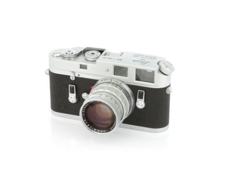 A Leica M4 Rangefinder Camera, 1966, chrome, serial no. 1180102, with Leitz Summicron f/2 50mm lens, 1960, chrome, serial no.