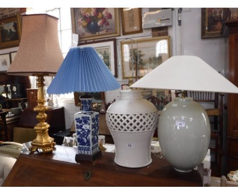 THREE CERAMIC LAMPS, two with shades and one other gilt table lamp with shade (4)