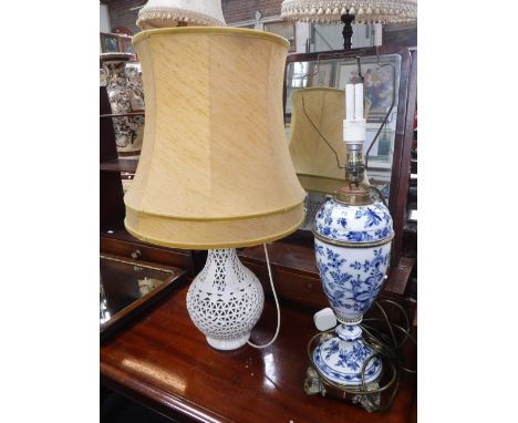 A 'MEISSEN' BLUE AND WHITE PORCELAIN OIL LAMP with Egyptian style brass mounts, fitted for electricity and one other Oriental