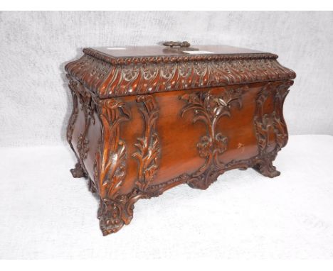 A CHIPPENDALE STYLE CARVED WOOD TEA CADDY