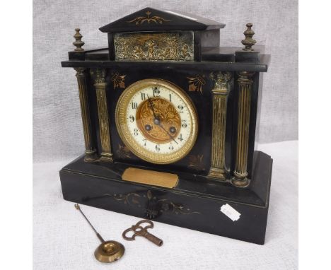 AN EDWARDIAN SLATE MANTEL CLOCK with brass mounts with a presentation inscription, dated 1910