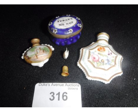 A SMALL ENAMEL PATCH BOX 'Forget me Not' and two small scent flasks