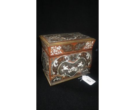 A BOULLE-WORK TEA CADDY decorated with engraved brass and ivory against a wooden ground