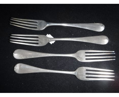 THREE GEORGIAN SILVER TABLE FORKS and a Victorian table fork (4)