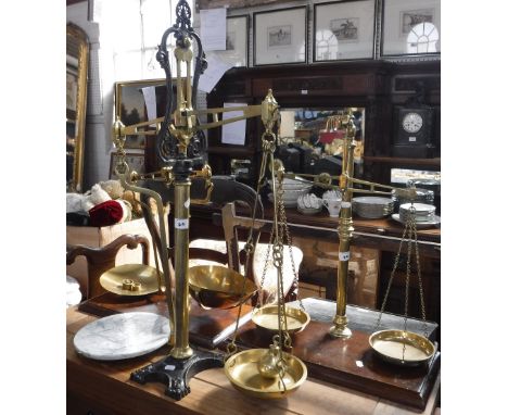 A SET OF AVERY BRASS SCALES, a set of M. Mark & Son brass scales and one other  set of Avery scales (3)