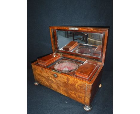 A GEORGE III MAHOGANY TEA CADDY with a central cut-glass sugar bowl