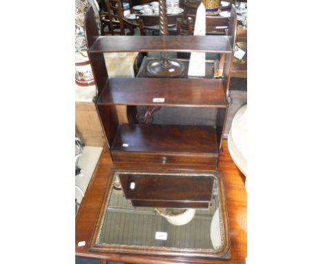 A MAHOGANY HANGING WALL SHELF with single drawer and a wall mirror (2)