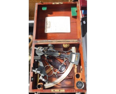 A SEXTANT in fitted case, the scales signed 'Heath & Co Ltd, Crayford, London', with certificate and various fittings