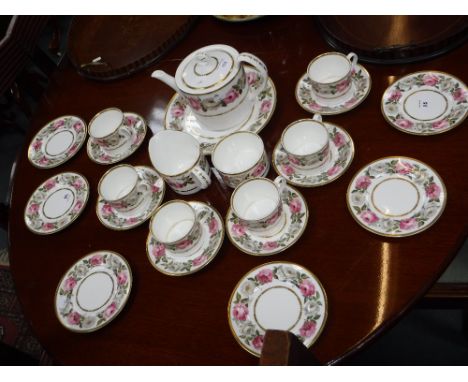 A ROYAL WORCESTER CHINA TEASET with pink and white rose decoration